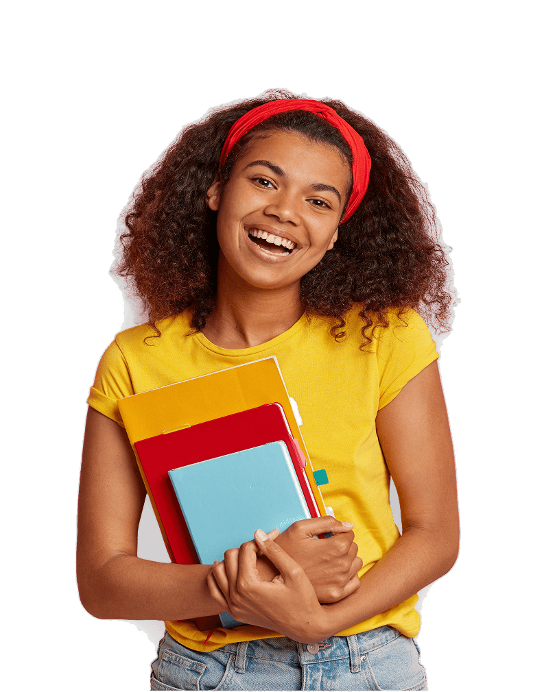 Smiling student holding notebooks